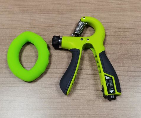 Un renforcement de cinq doigts, un manche, un exercice de force, un exercice portable en métal, un bracelet en silicone, un logo personnalisé