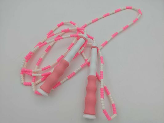 Corde à sauter Corde en nylon à perles douces avec une longueur réglable et des poignées ondulées Conçues pour l'exercice modéré et le fitness des enfants