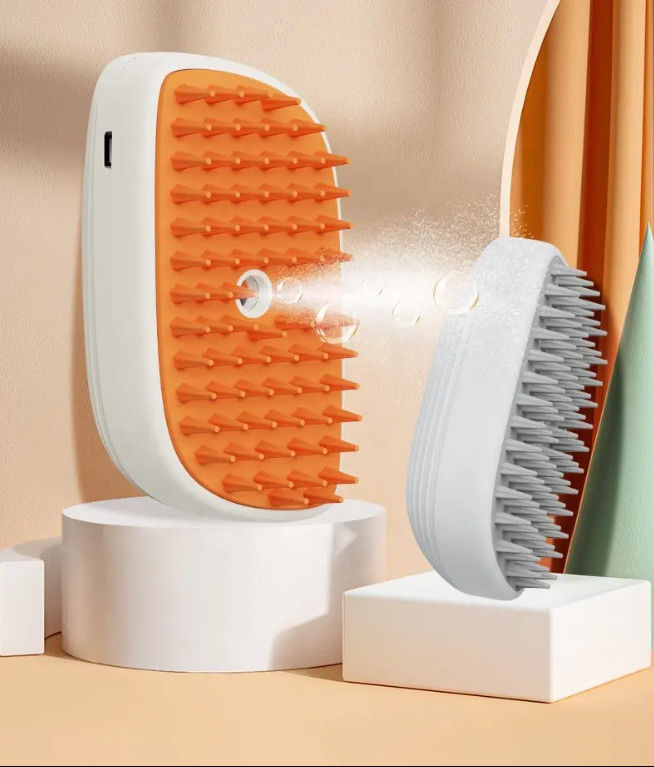 Fabrique en gros 3 en 1 Pinceau à vapeur pour les animaux de compagnie Massage Nettoyage à l'eau Spray Vente à chaud épilation de chat Pinceau à vapeur avec Lig
